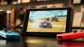 Mario ridin a motorbike on tha Nintendo Switch.