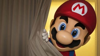 A creepy-looking photo of Mario, or an actor dressed as the character, peeking around a curtain.