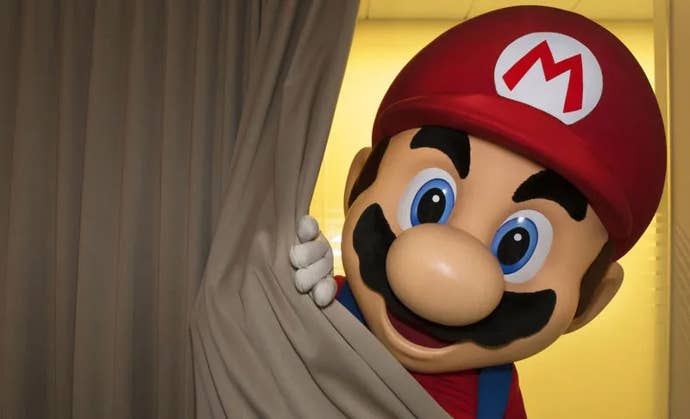 A creepy-looking photo of Mario, or an actor dressed as the character, peeking around a curtain.