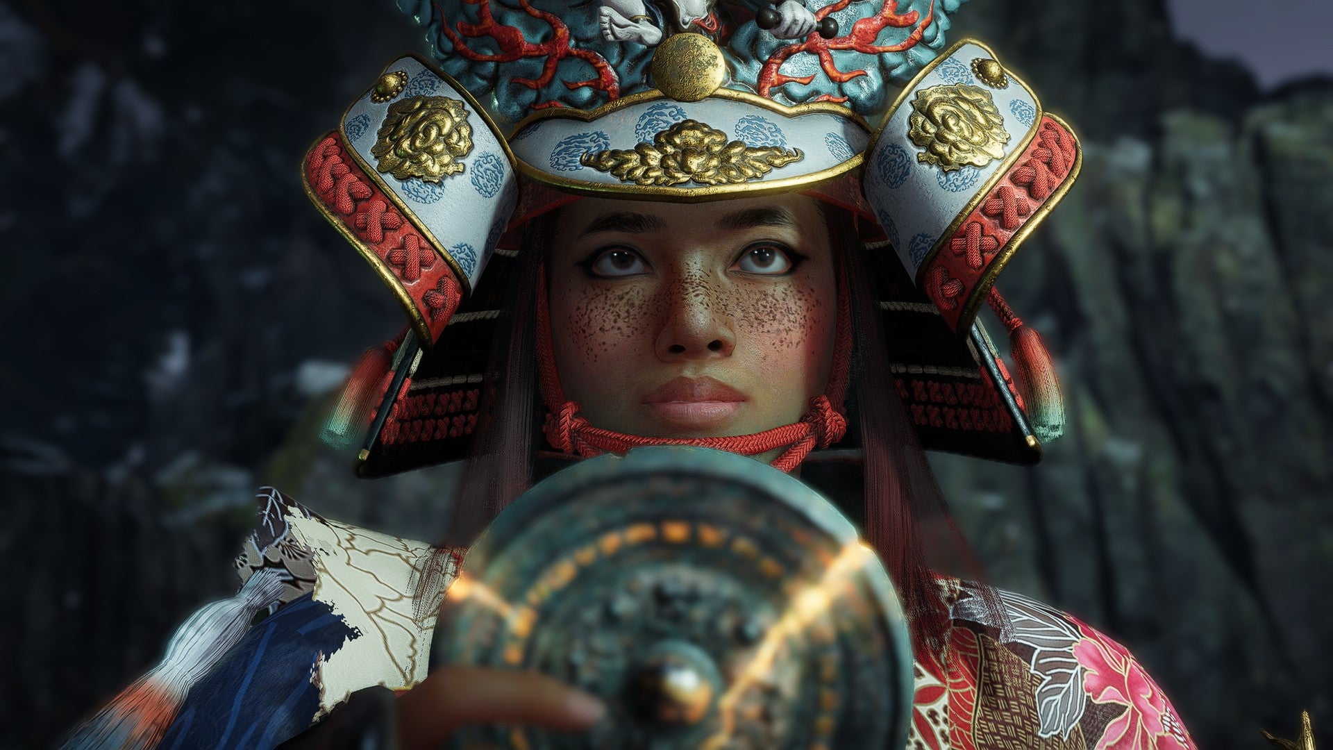 Nioh 3's protagonist Tokugawa Takechiyo holds a glowing amulet and looks into the distance. - 1