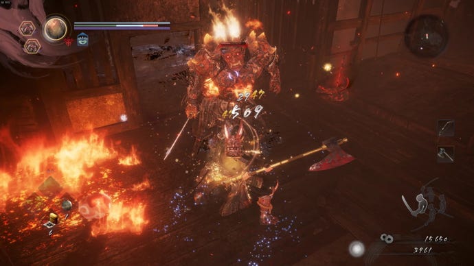 I swing my axe at a fiery, humanoid yokai. Fire spreads through the room we’re in.