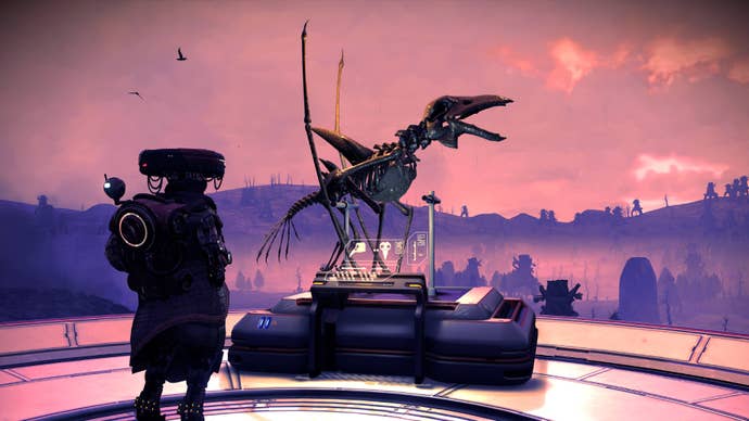A character staring at a big alien fossil display in No Man’s Sky.