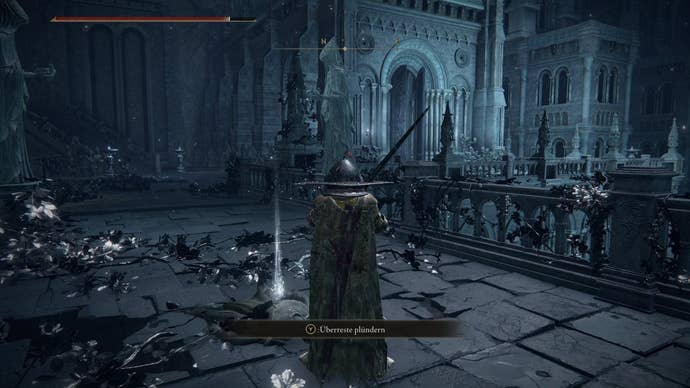 A warrior finds an item on a corpse in Nokstella in Elden Ring