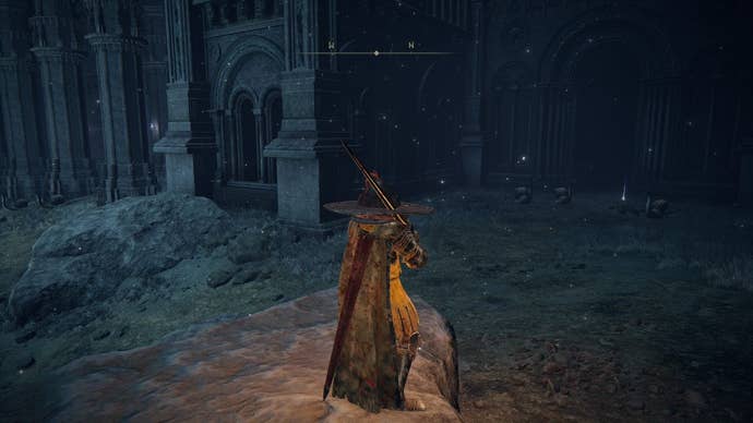 A warrior stands on top of a rocky outcrop outside a church building ruin in Nokstella in Elden Ring