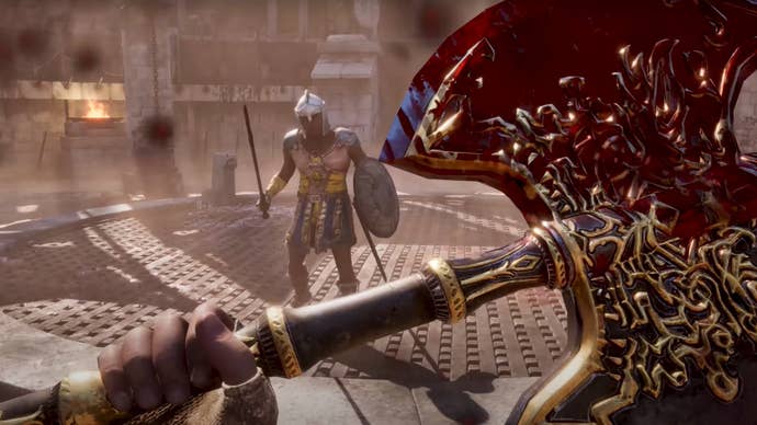 A first-person battle in The Elder Scrolls IV: Oblivion Remastered against a gladiator in an arena. The player’s axe is soaked with blood.