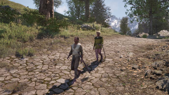 Two NPCs casually walking in Oblivion Remastered.