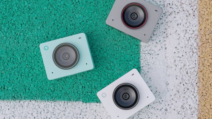 obsbot meet 2 webcams in green, white and grey