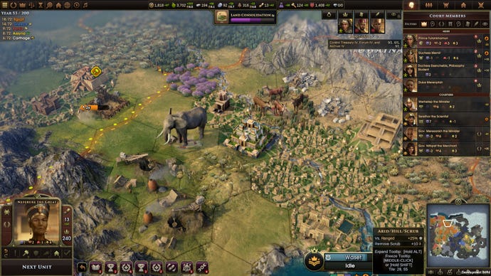 A hexagonal-based overhead map screen showing an elephant on a neighbouring tile to a town in Old World