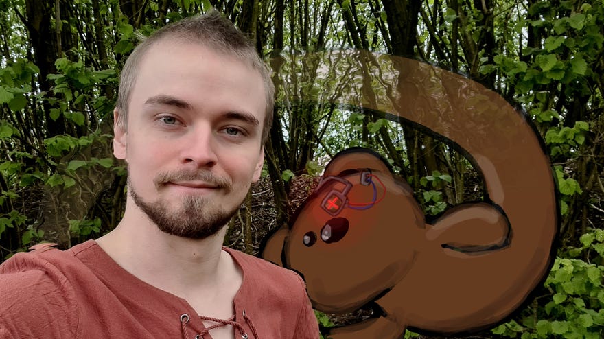 A photo of Ollie Toms, with Horace materialising out of stealth from behind him.