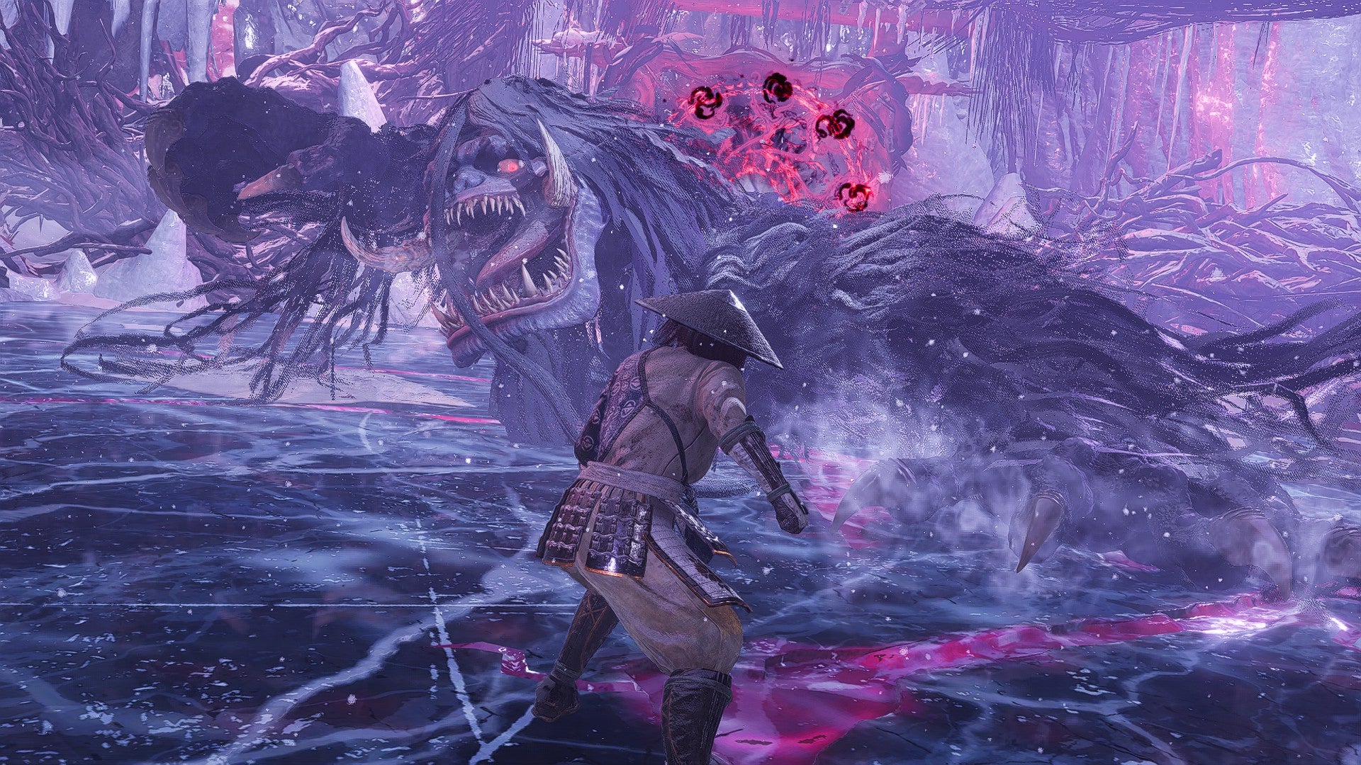 Otoroshi - a huge furry four-legged yokai - looms over the player in an icy arena in Nioh 3. - 27