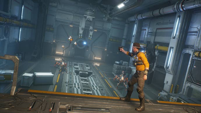 A screenshot of Outcast 2 showing protagonist Cutter Slade aiming at some robots in an indoor scifi environment.