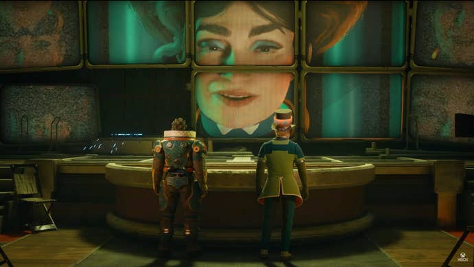 Two soldiers consult a slope of screens connected which their motherly CEO gives orders.