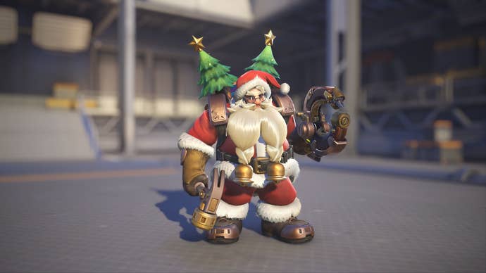 Torbjörn models his Santaclad skin in Overwatch 2.