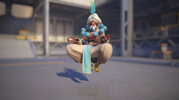 Zenyatta models his Djinnyatta skin in Overwatch 2.