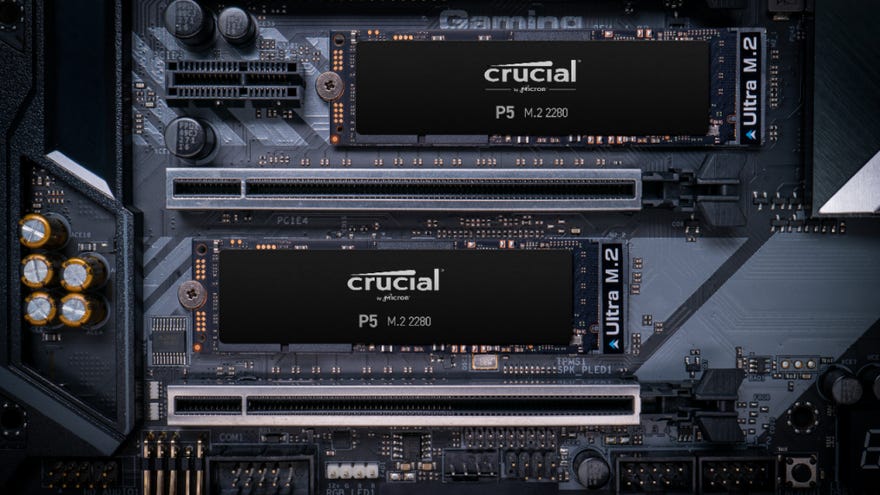 a photo of two Crucial P5 SSDs in a computer motherboard