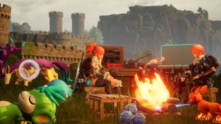 Two player characters in Palworld sitting by a campfire, a castle and clifface behind them, Pals relaxing around them.