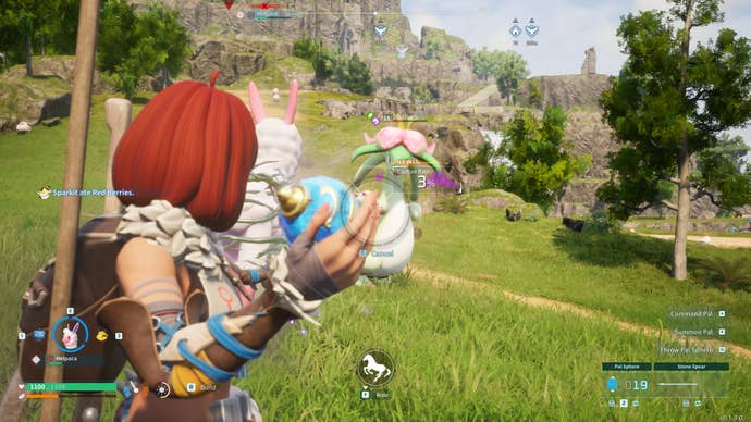 A female character prepares to throw a ball at a monster in Palworld