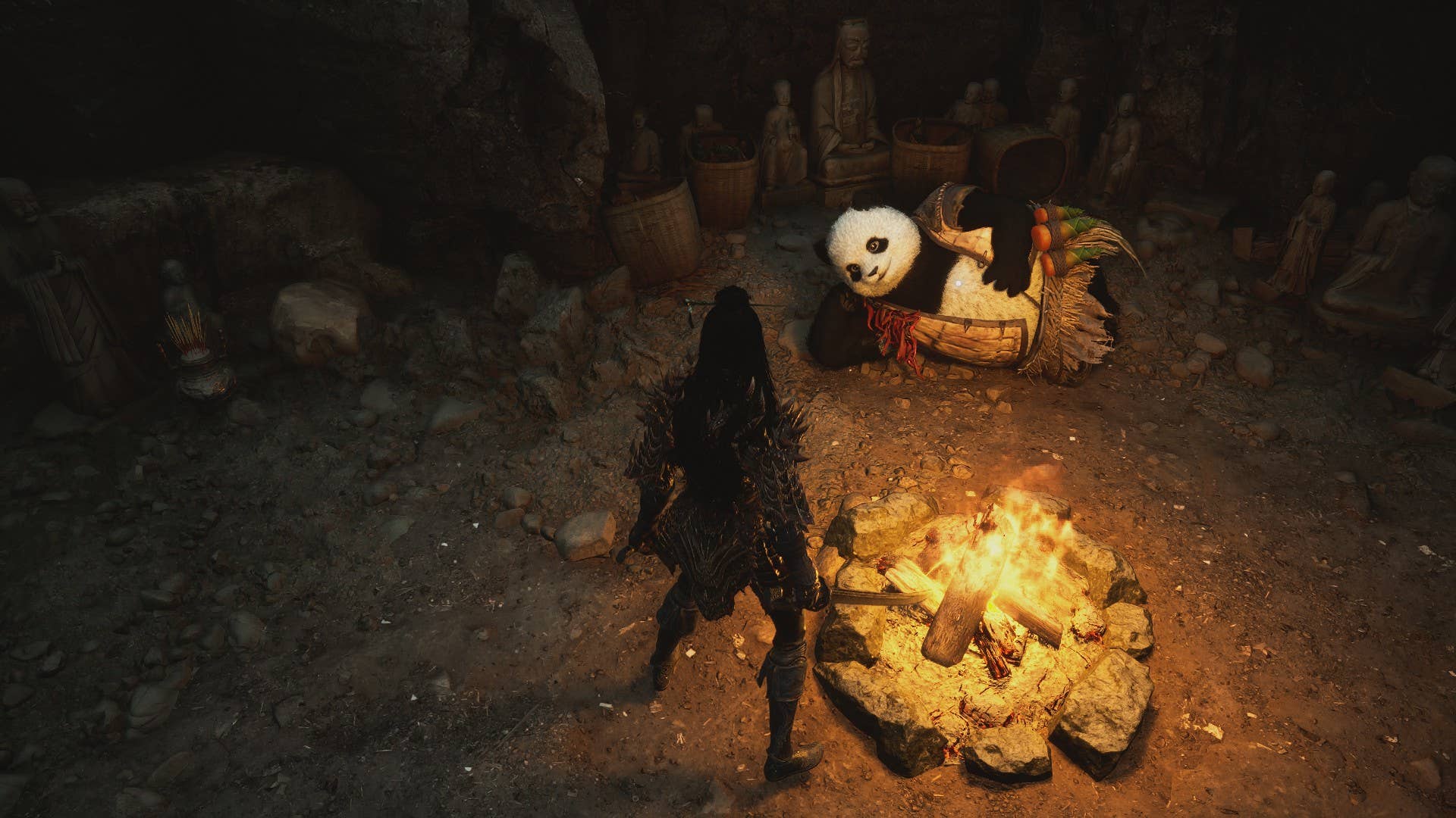 A big ol' chubby Panda hangs out in front of a fire in Wuchang Fallen Feathers, ready to accept Bamboo Shoots for rare items.