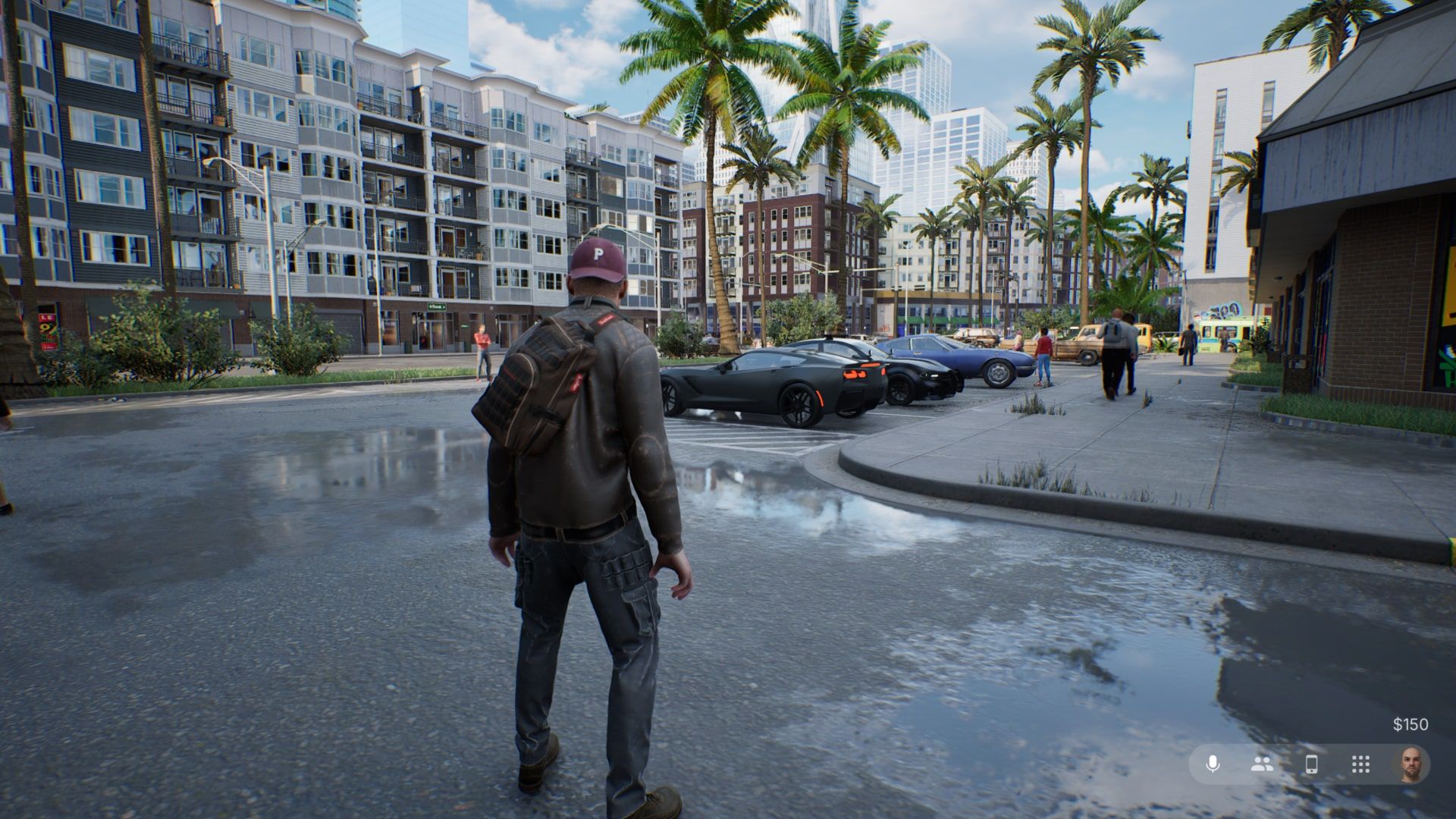 A man in a hoody stands on wet asphalt with a row of cars ahead of him and palm trees in the distance. - 1