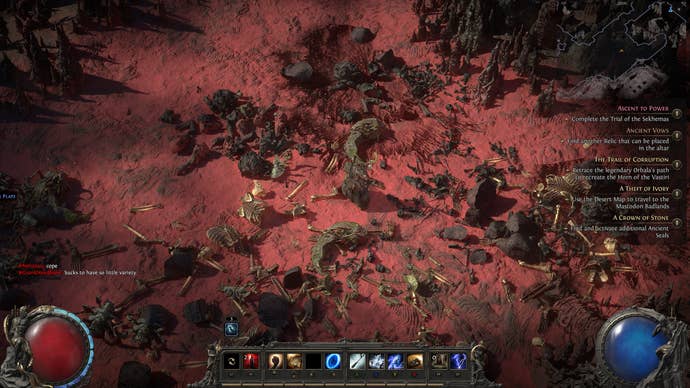 A character stands in a desert scene surrounded by the detritus of fallen enemies.