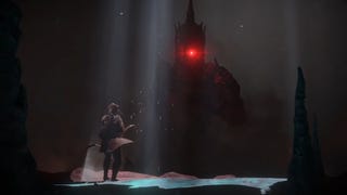 A screenshot from the Path of Exile 2 trailer showing a character facing a large creature enveloped by darkness.