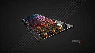 roccat vulcan 121 mechanical gaming keyboard shown from the side, with a german-style flag
