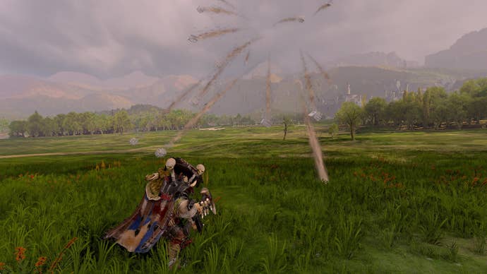 Pelting a big orc with big rocks in Total War: Warhammer III.