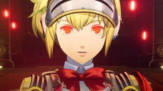 Robot character Aigis' eyes glow red as she prepares to summon a persona in Persona 3 Reload DLC The Answer