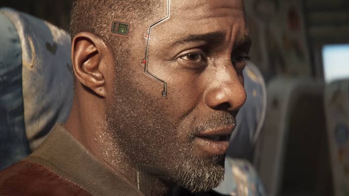 A close-up of Solomon Reed’s (Idris Elba’s) face in the Cyberpunk 2077 Phantom Liberty cinematic trailer.