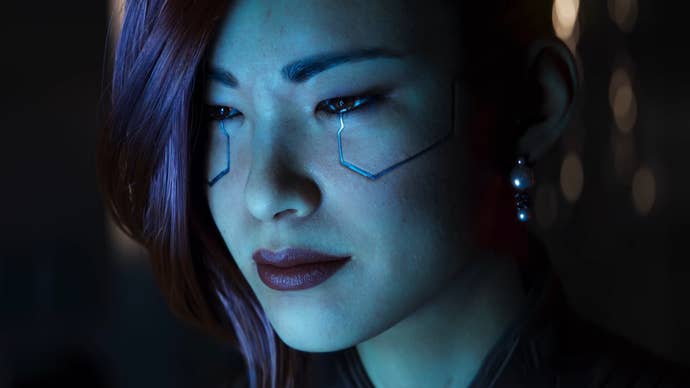 A close-up of Songbird’s face in the Cyberpunk 2077 Phantom Liberty cinematic trailer.