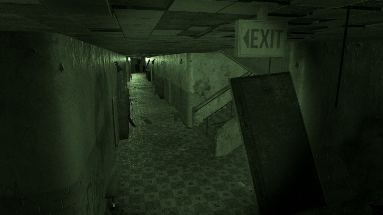 A hospital corridor can be seen via a night vision camera in Phasmophobia - 10