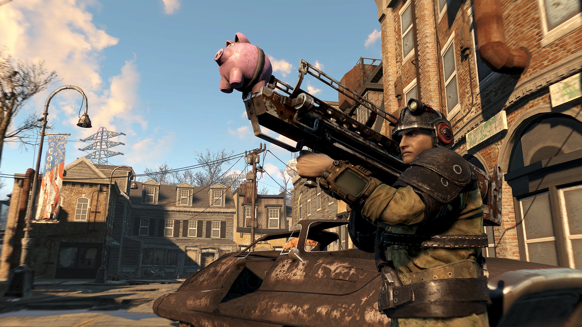 A Fallout 4 player hefting a launcher with a piggy bank sticking out of it on a sunny street - 1