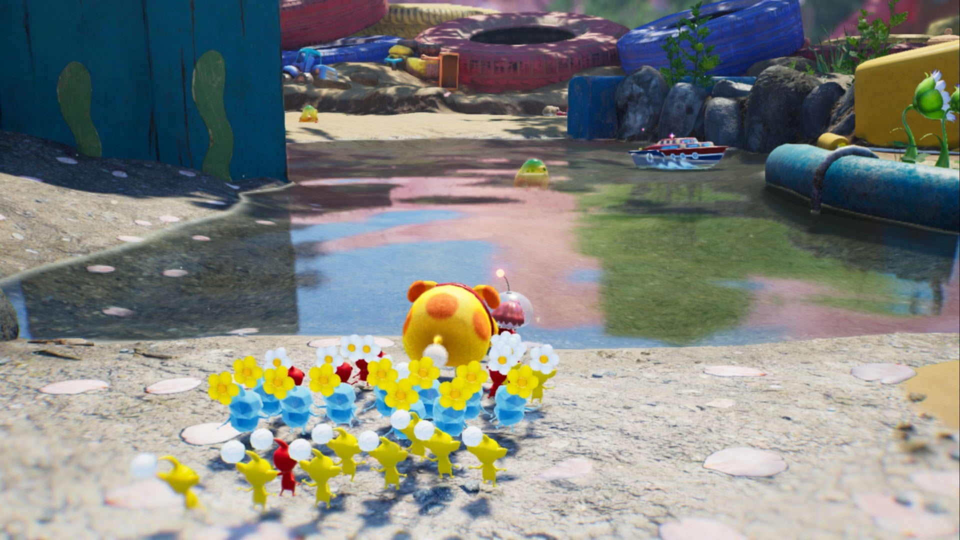 pikmin 4 nintendo screenshot yellow red ice pikmin and oatchi facing water