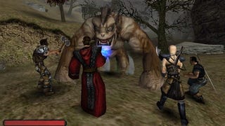 Four fantasy warriors battle a large monster in Gothic.