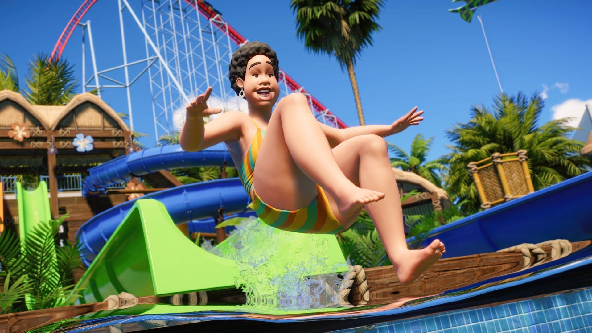 A Planet Coaster 2 screenshot showing a park guest shooting off the end of a water slide into a pool.
