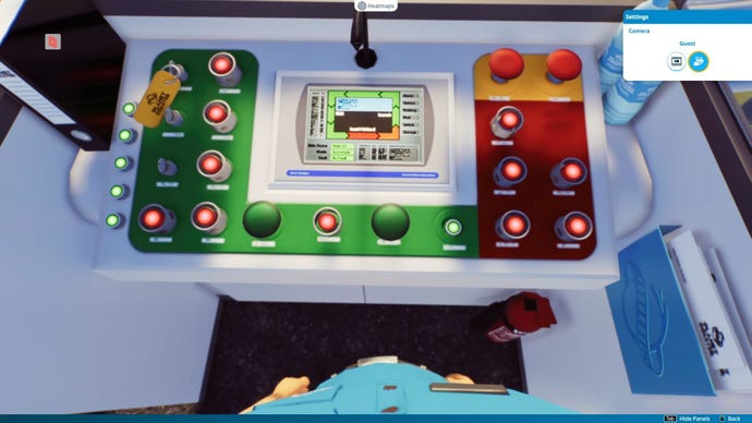 A view from the perspective of a roller coaster attendant looking down at his controls.