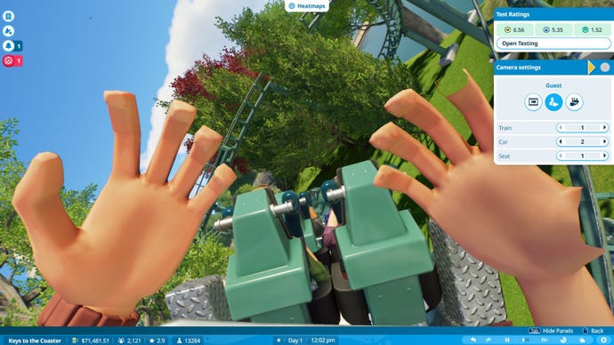 The camera shows a roller coaster from the point of view of a passenger, with their arms raised.