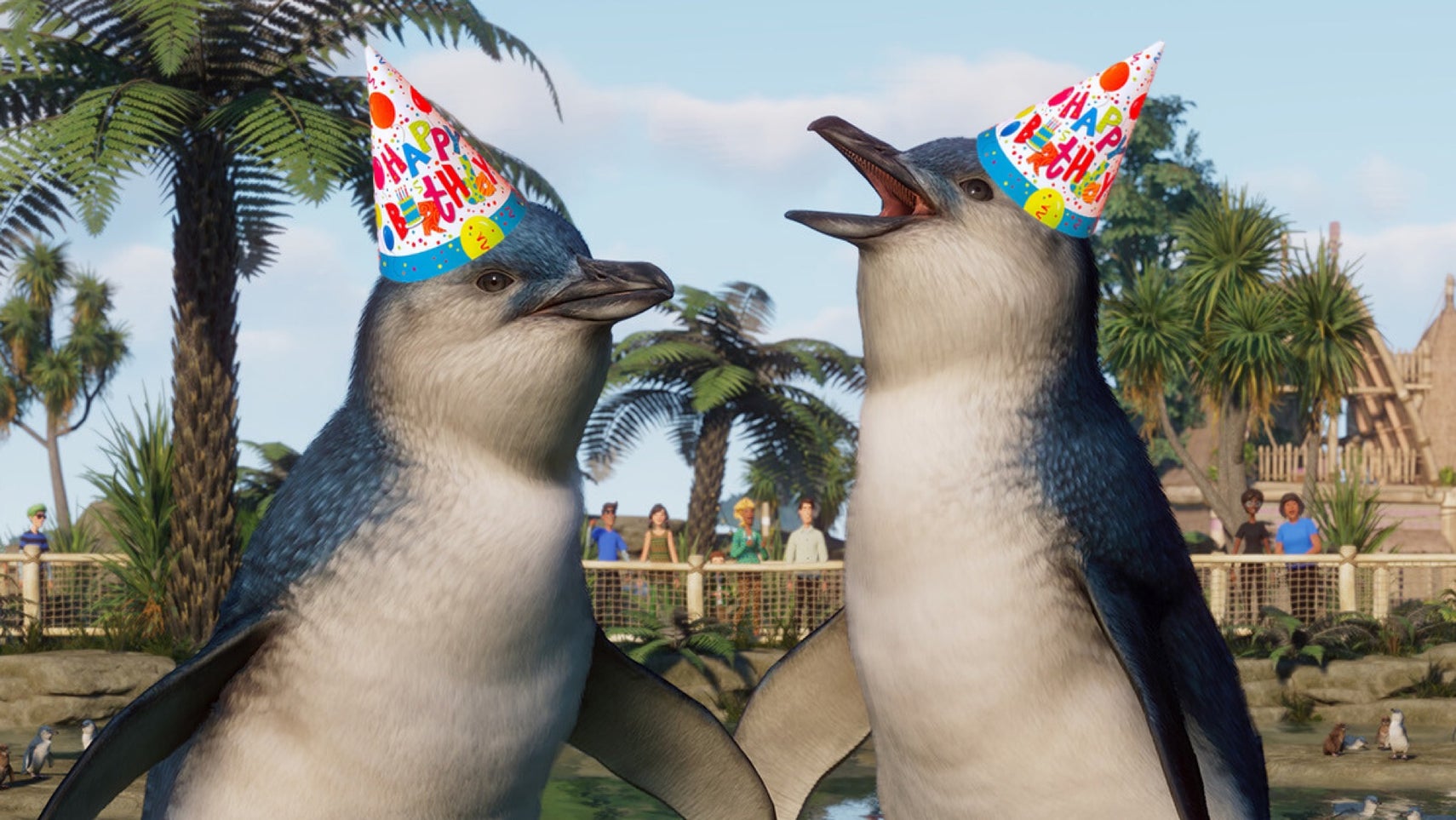 Planet Zoo screenshot showing two penguins, both with birthday hats superimposed onto their heads.