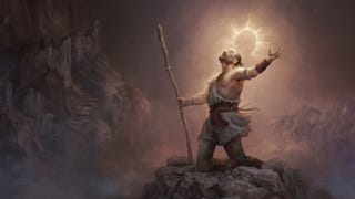 A kneeling male-presenting character in a robe with a staff, who seems to prey to a deity above as a golden kind of a halo glows around their head.