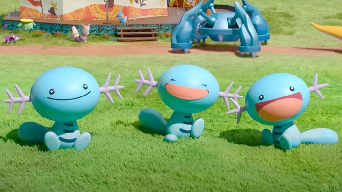 A scene from the stop-motion Pokémon Concierge showing three happy Woopers sat on a lawn.