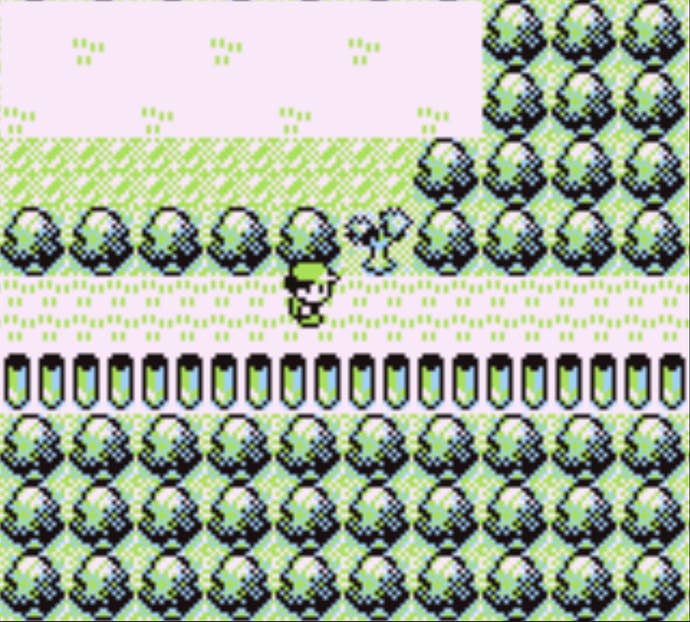 Red standing next to the tree that blocks the location of HM 02 Fly in Pokemon Red.