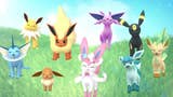 The Pokémon Go version of Eevee alongside the creature's different evolutions, all standing together in a grassy setting.