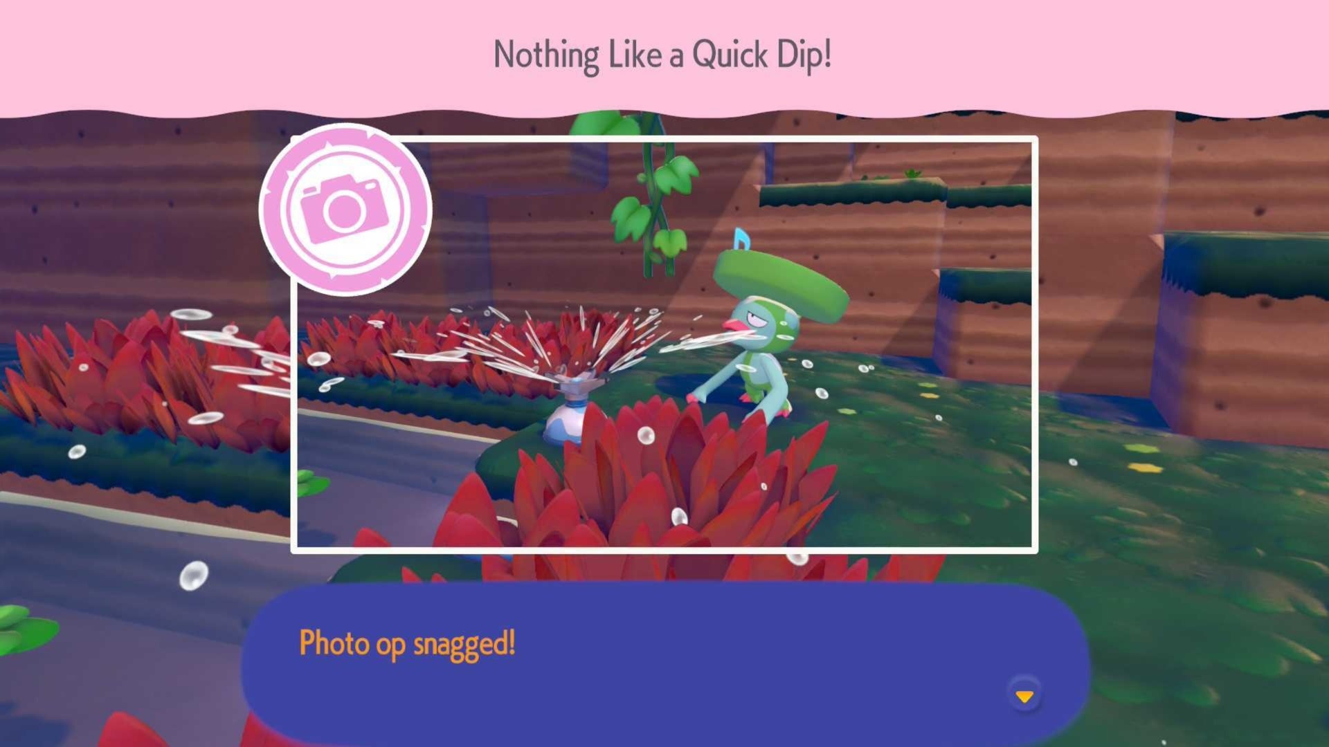 Pokopia Llombre playing in a water sprinkler