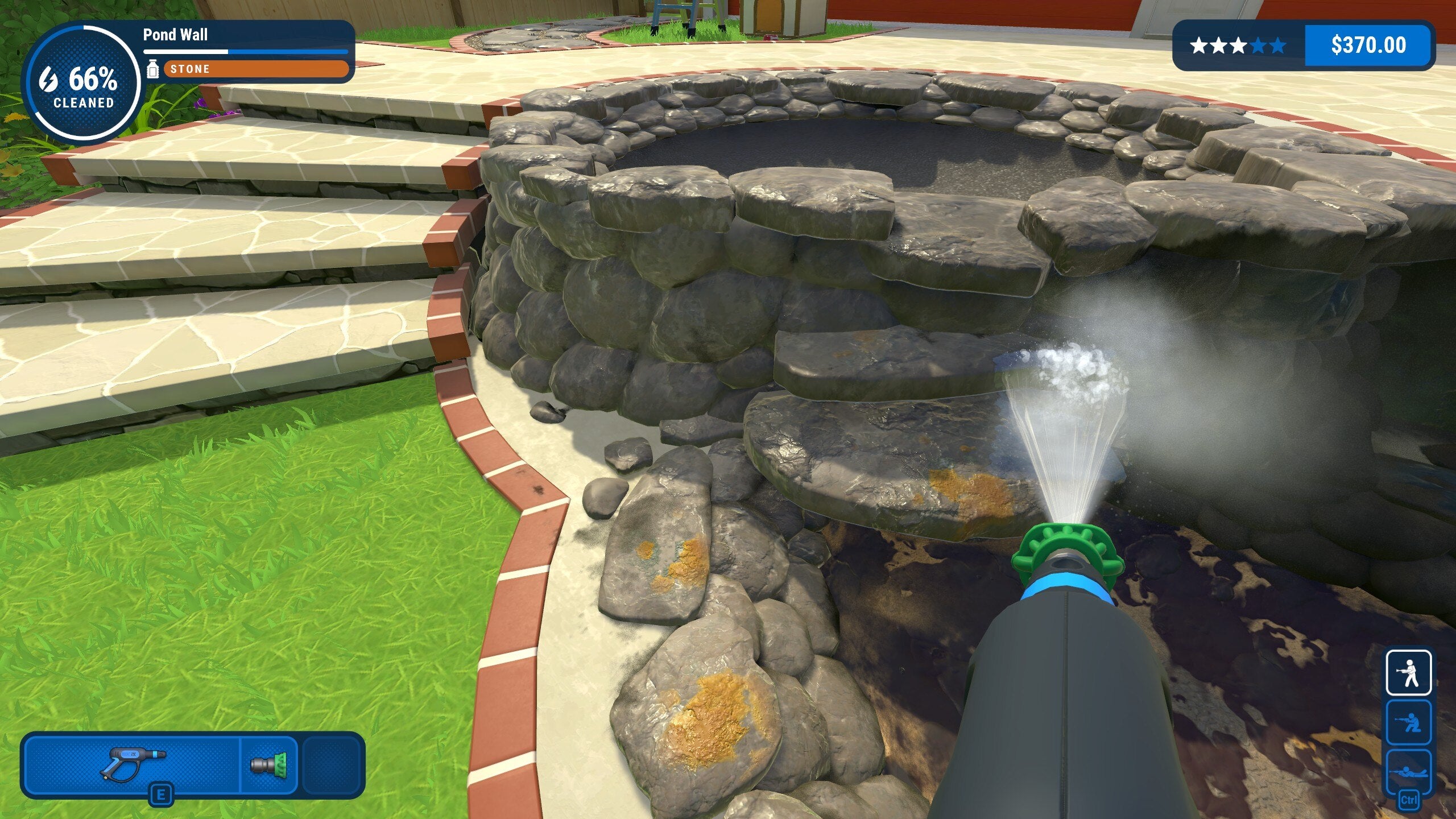 A power-washer blasts dirt off the filthy rocks surrounding a pond in someone&rsquo;s back garden.