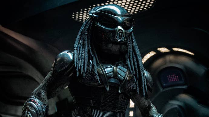 A Predator in a metallic, militaristic outfit in The Predator.