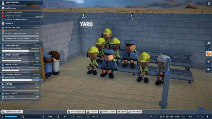 Staff of a prison relax in the yard intended for inmates.