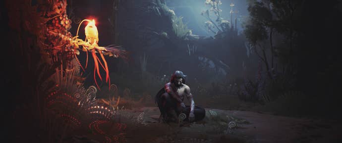 A pale, grey skinned masculine character sits cross-legged on the floor of a fantasy area with a orange, glowing bird on a branch nearby. It's a screenshot from 11 bit Studio's cancelled game Project 8.