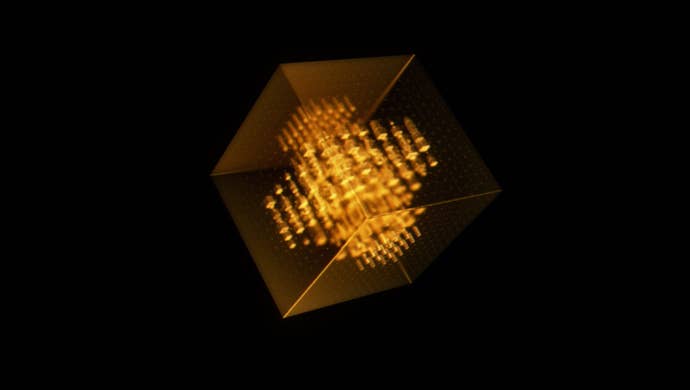 A glowing golden cube in darkness