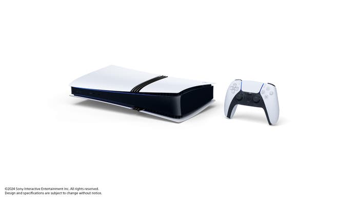 PS5 Pro lies on its side next to a DualSense controller