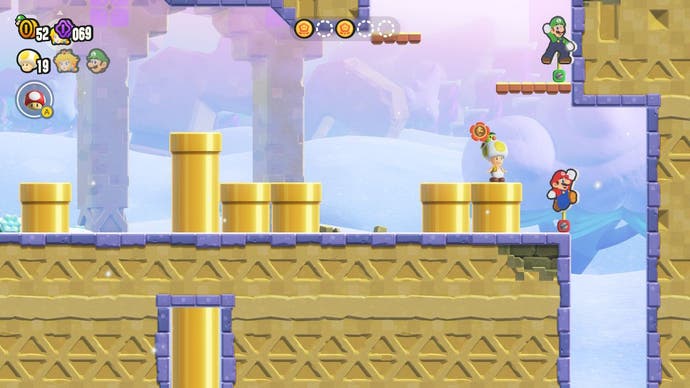 Toad prepares to jump down into a tunnel to grab a hidden reward in Super Mario Bros Wonder